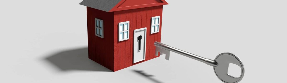 depiction of rental property manager with a small red house and silver key Bergan & Company Property Management Denver, Centennial, Colorado