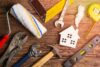 rental property maintenance with level, tape measure, tools Bergan & Company Property Management Denver, Centennial, Colorado